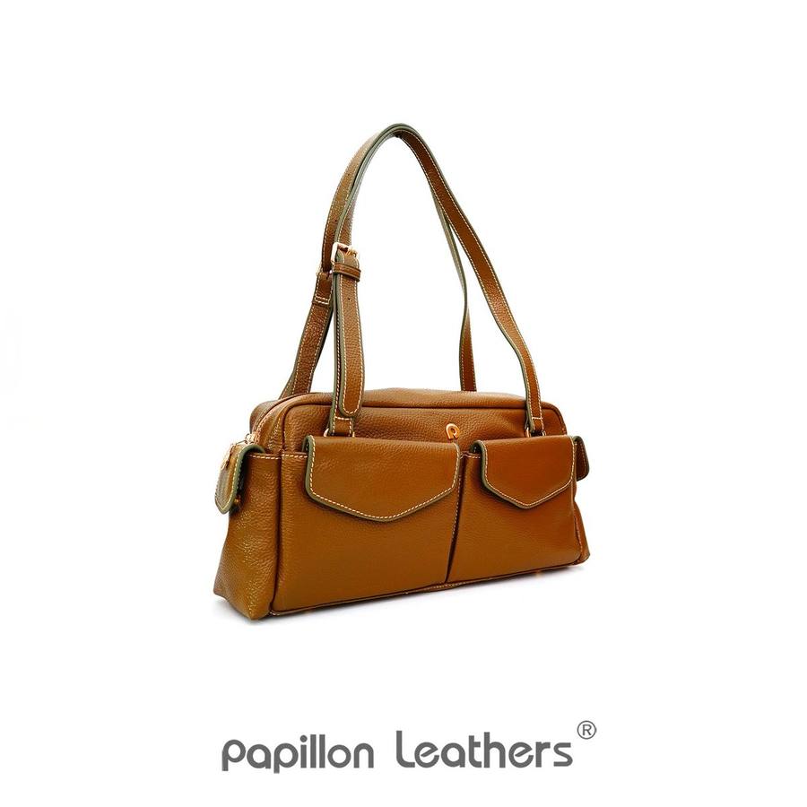 Patina alami pada tas kulit Papillon setelah pemakaian