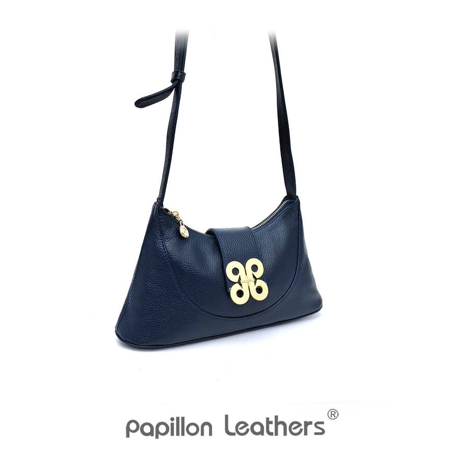Detail jahitan dan hardware pada tas kulit Papillon